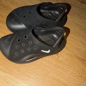 Nike Black Perforated Slip-Ons